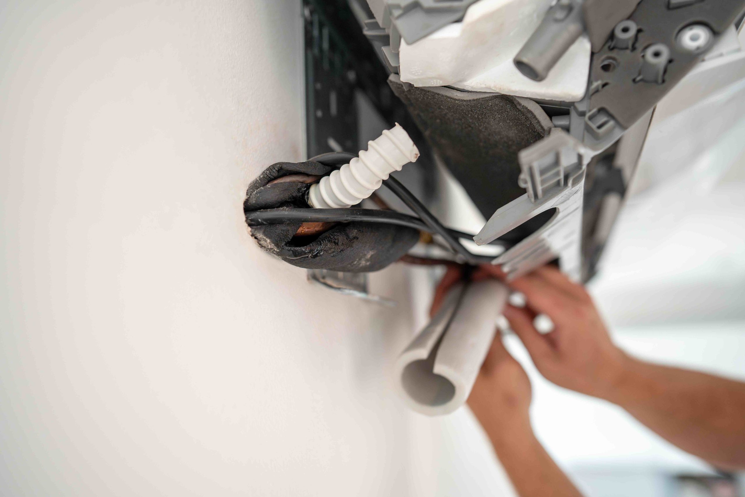 How to Flush Your AC Condensate Line and Prevent Clogs