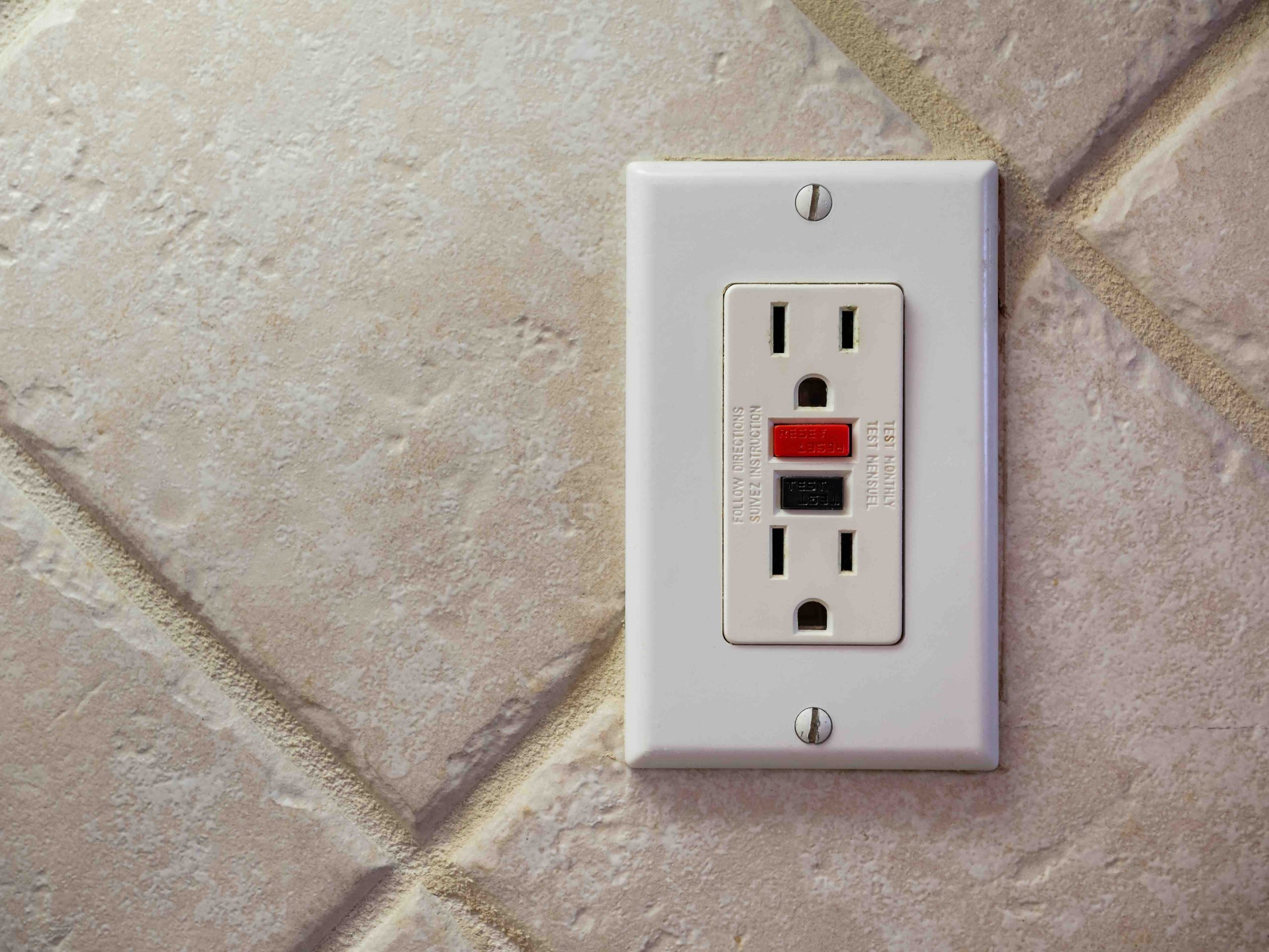 What That Little Outlet Button Does and Why It Matters
